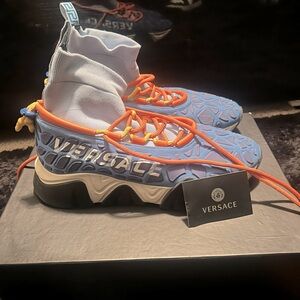 Versace. Normal wear.